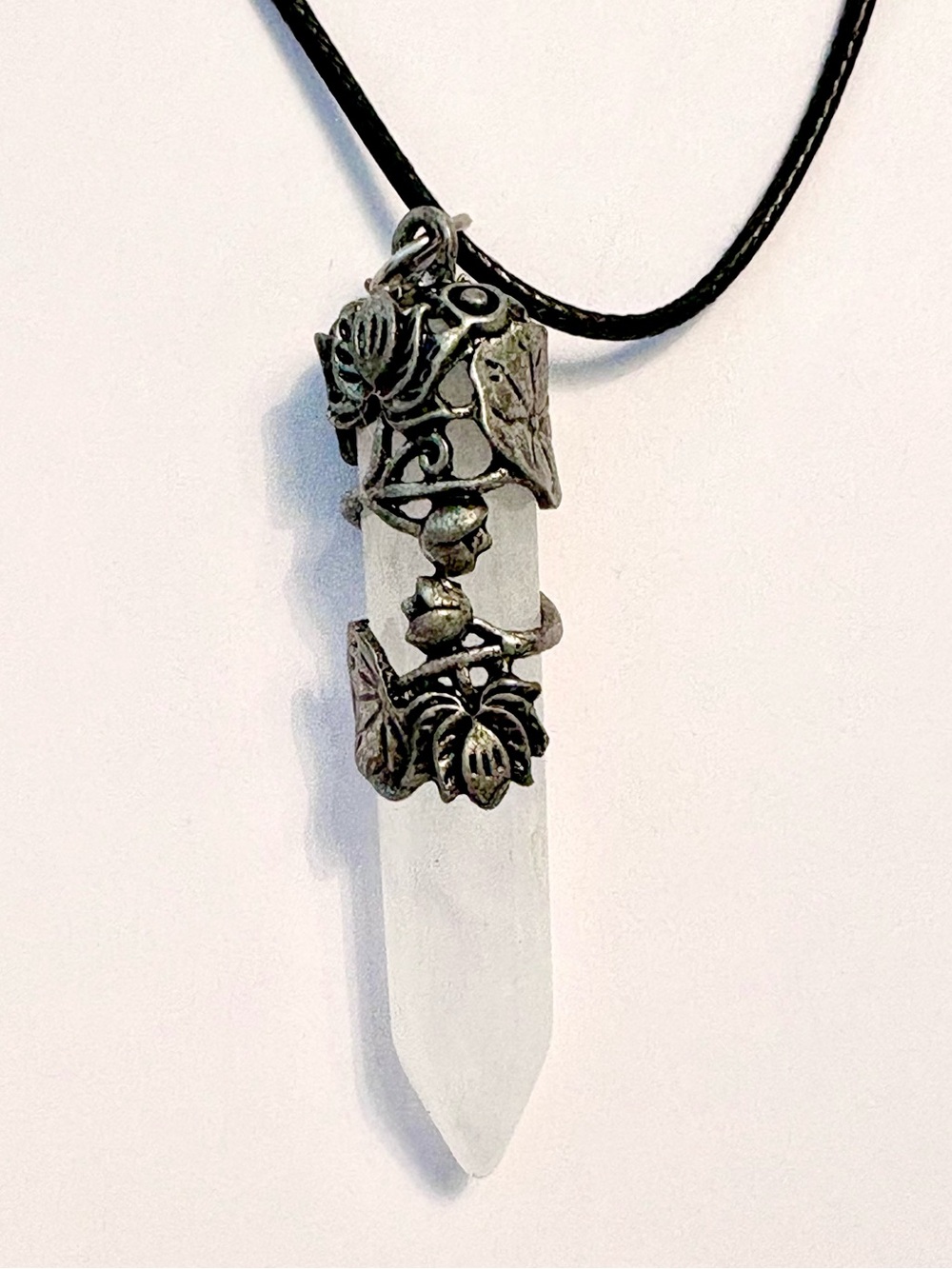 Beautiful, handcrafted, 2 1/2 inch Crystal with Putter flowers, on a black chain